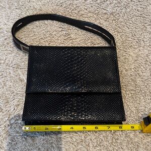 Black ladies vintage DOFAN made in France Snakeskin Bag. In great shape.